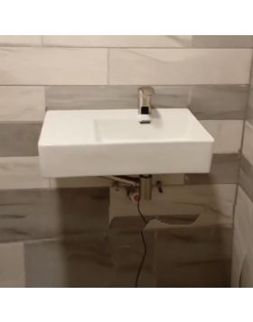 Hoe plaats ik een wastafel?