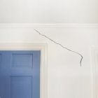 Hoe repareer ik een beschadigde pleisterwand?